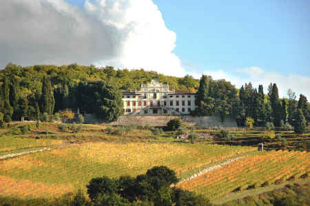 Villa Vistarenni viewed across its vineyards